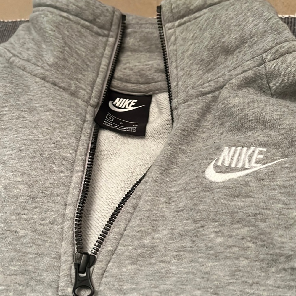 I am selling a Nike girls club fleece jacket